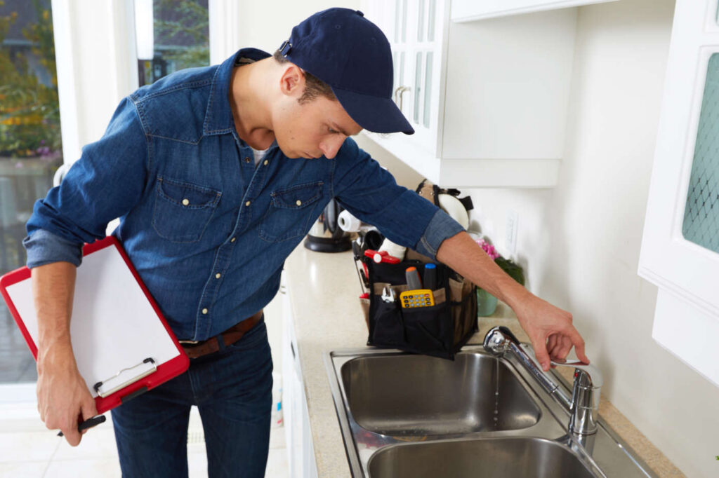 Plumber holding clipboard